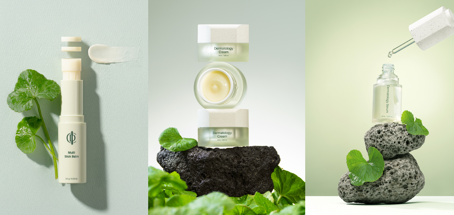 Natura Glow Dermatology Cream on lava stone with botanical leaves